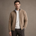 Man wearing camel merino zip jacket over a shirt