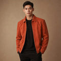 Orange suede trucker jacket with shirt collar and full-length zip
