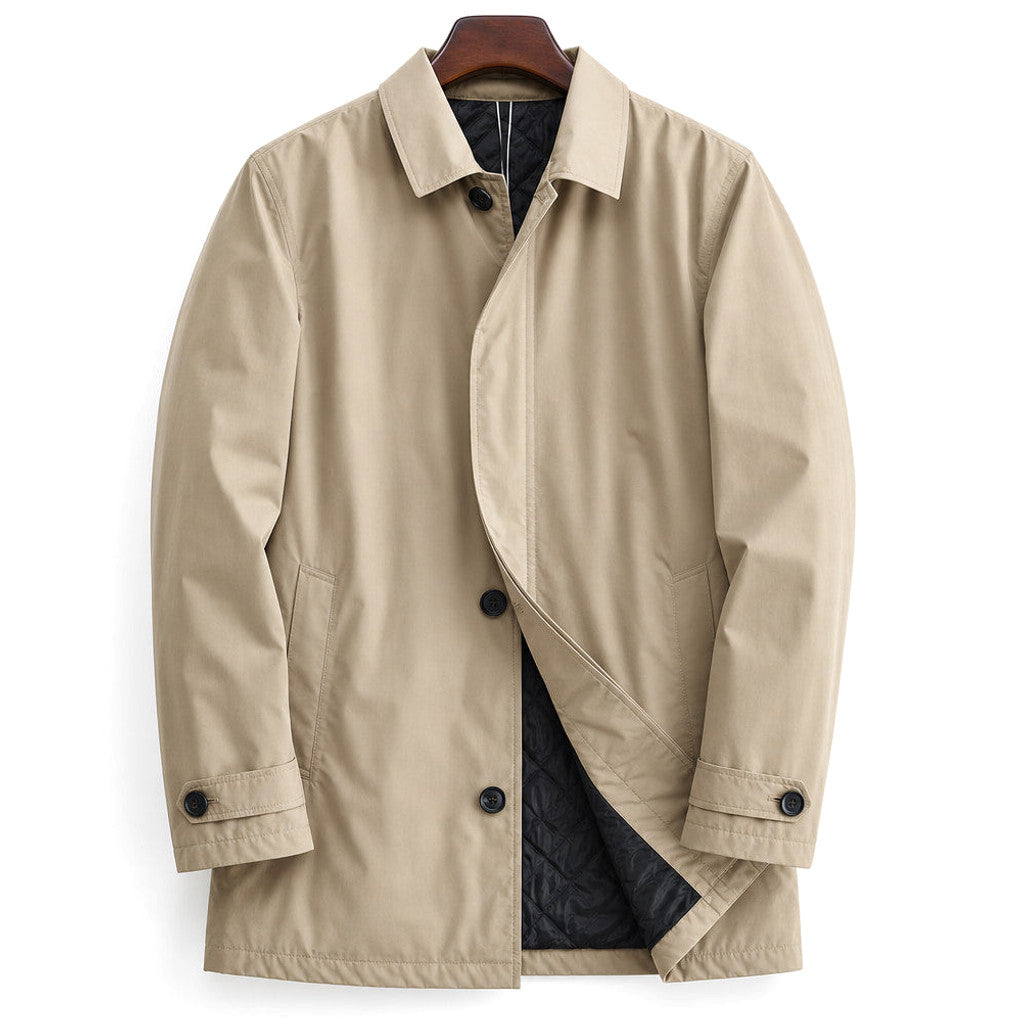 Man wearing beige wind-resistant coat with adjustable cuffs