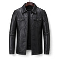 Man wearing a slim-fit black moto jacket with dark denim