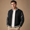 Black varsity jacket with wool body and leather sleeves, front view