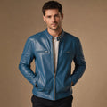 Teal blue leather cafe racer jacket with quilted shoulders and stand collar