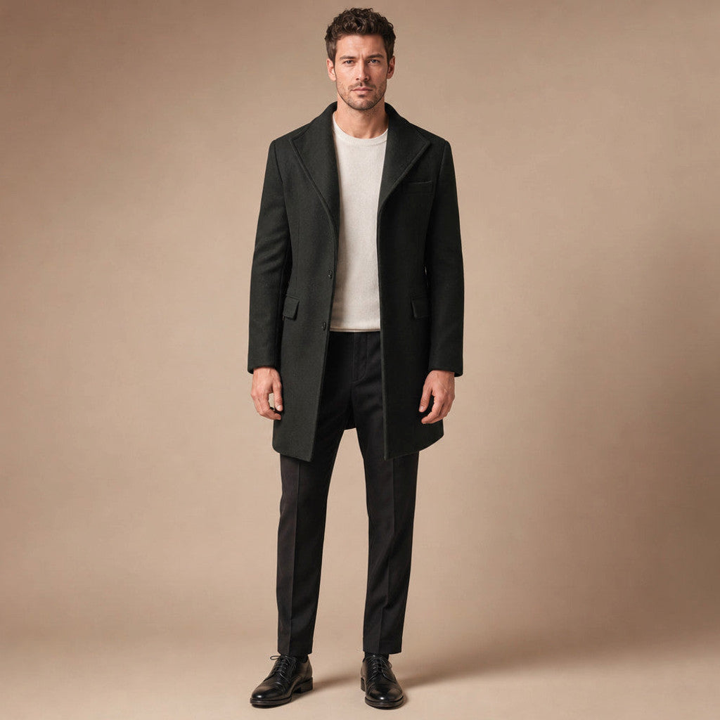 Black single breasted long wool coat shown flat with button front and flap pockets