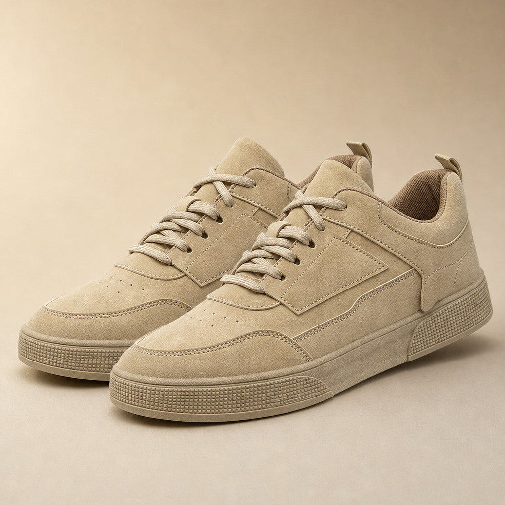 Taupe low-top trainer with textured upper and cushioned midsole