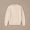 Man wearing champagne cable knit crewneck over a collared shirt
