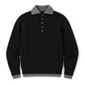 Man wearing black cable knit jumper with faux layered collar and dark denim