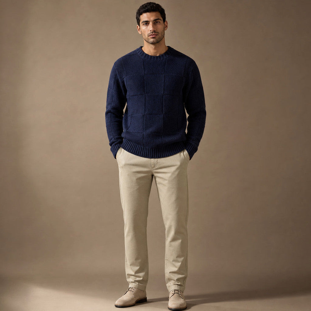 Textured knit sweater and matching straight-leg trouser set laid flat