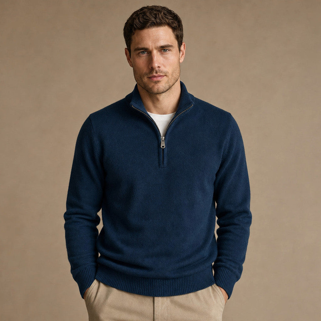 Navy half zip pullover with funnel collar and ribbed cuffs