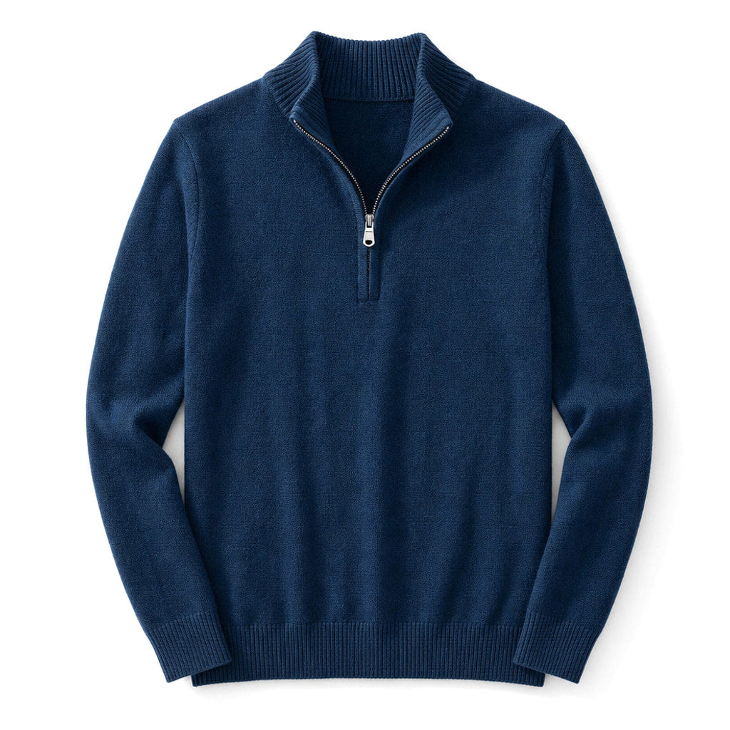 Man wearing navy funnel collar half zip pullover over a shirt