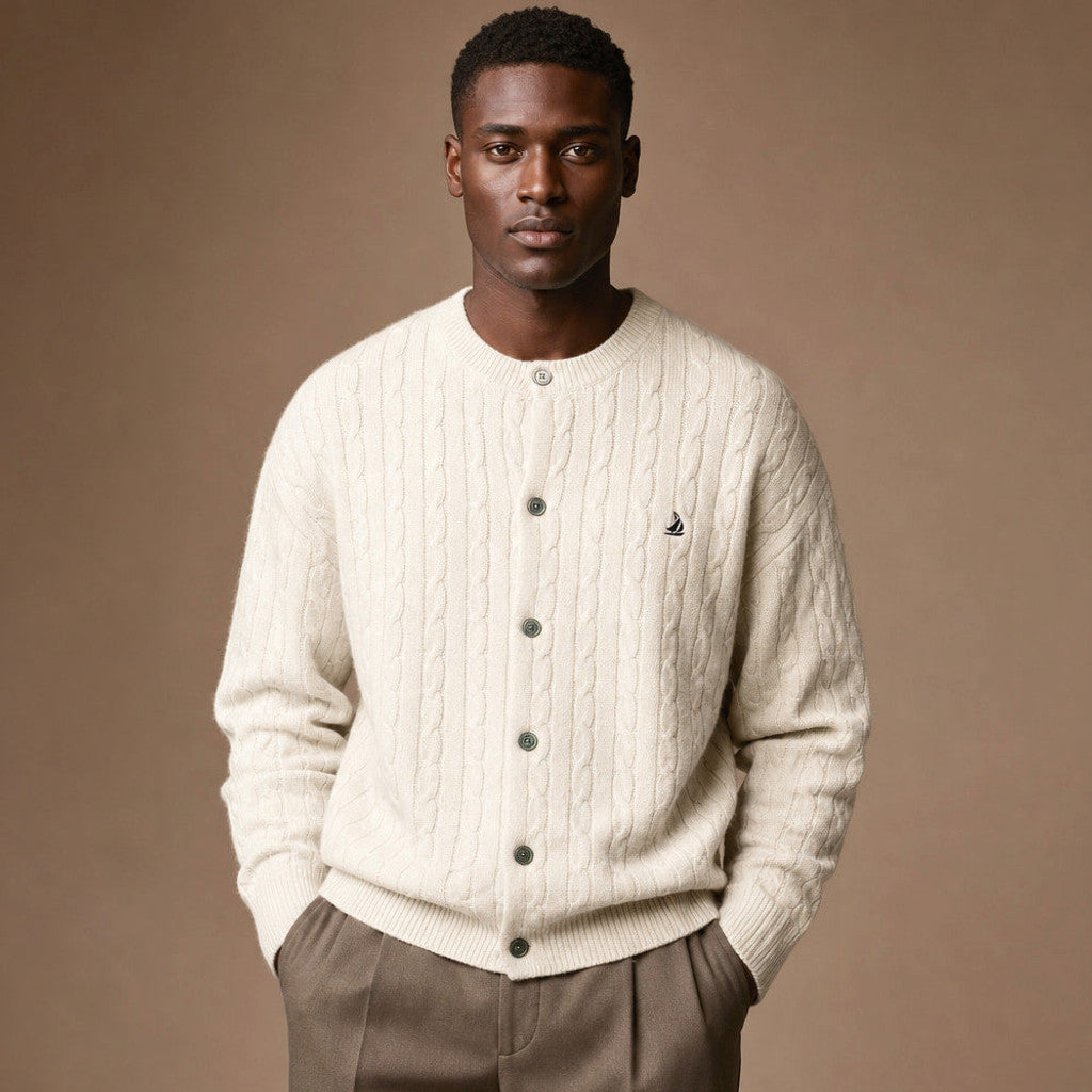 Ivory cable knit cardigan with button front and ribbed cuffs