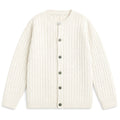 Man wearing ivory cable knit cardigan over a shirt