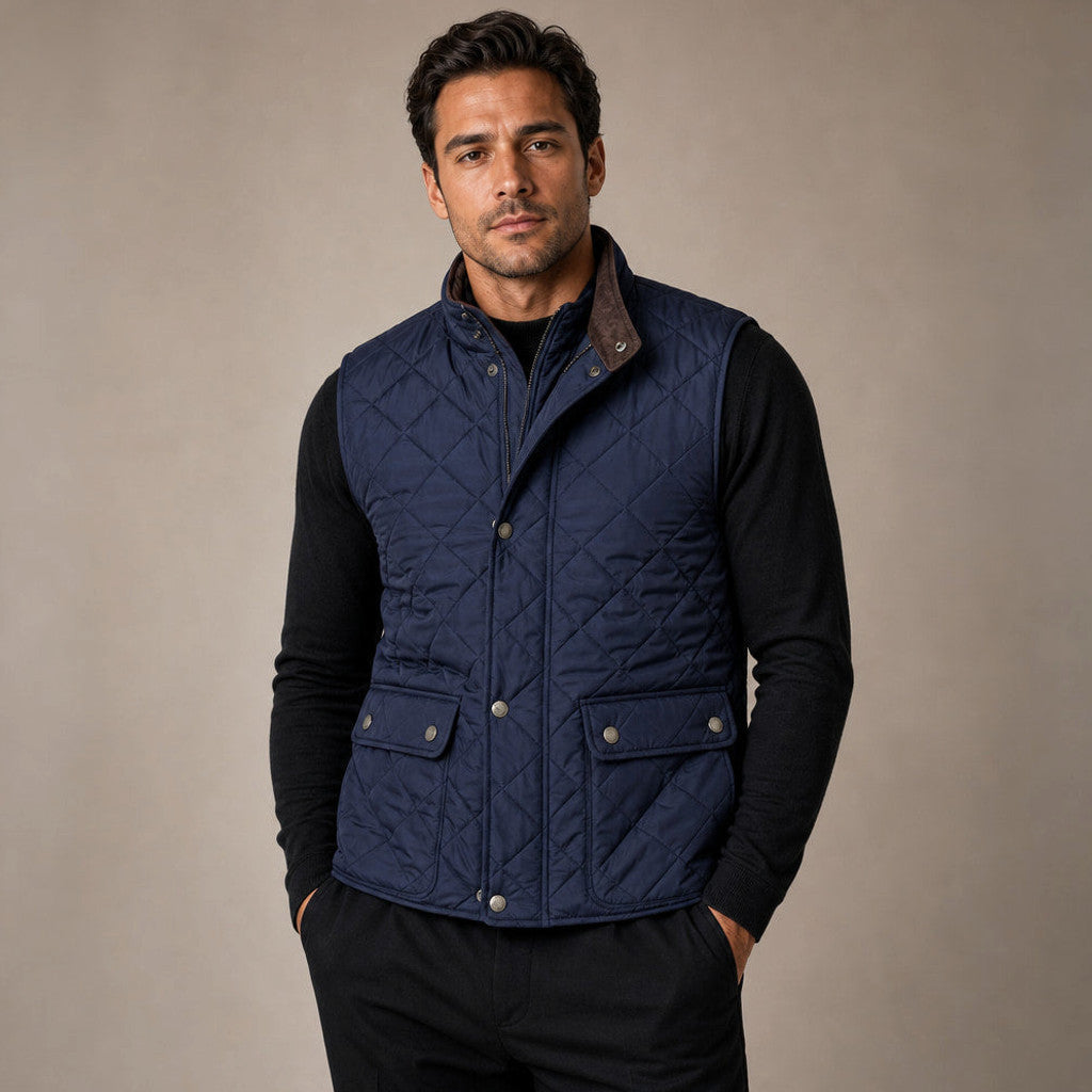 Man wearing blue quilted polo collar vest over a knit jumper