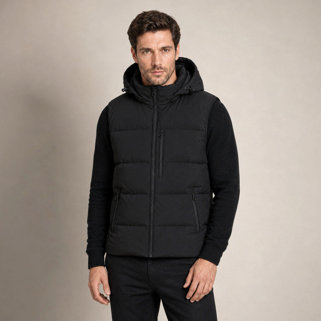 Black longline hooded puffer vest with full-length zip