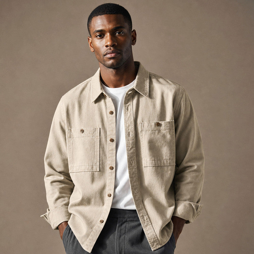 Man wearing a sandstone overshirt open over a plain tee