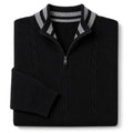 Man wearing black quarter zip wool jumper over a shirt