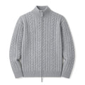Man wearing gray cable knit zip cardigan over a plain tee