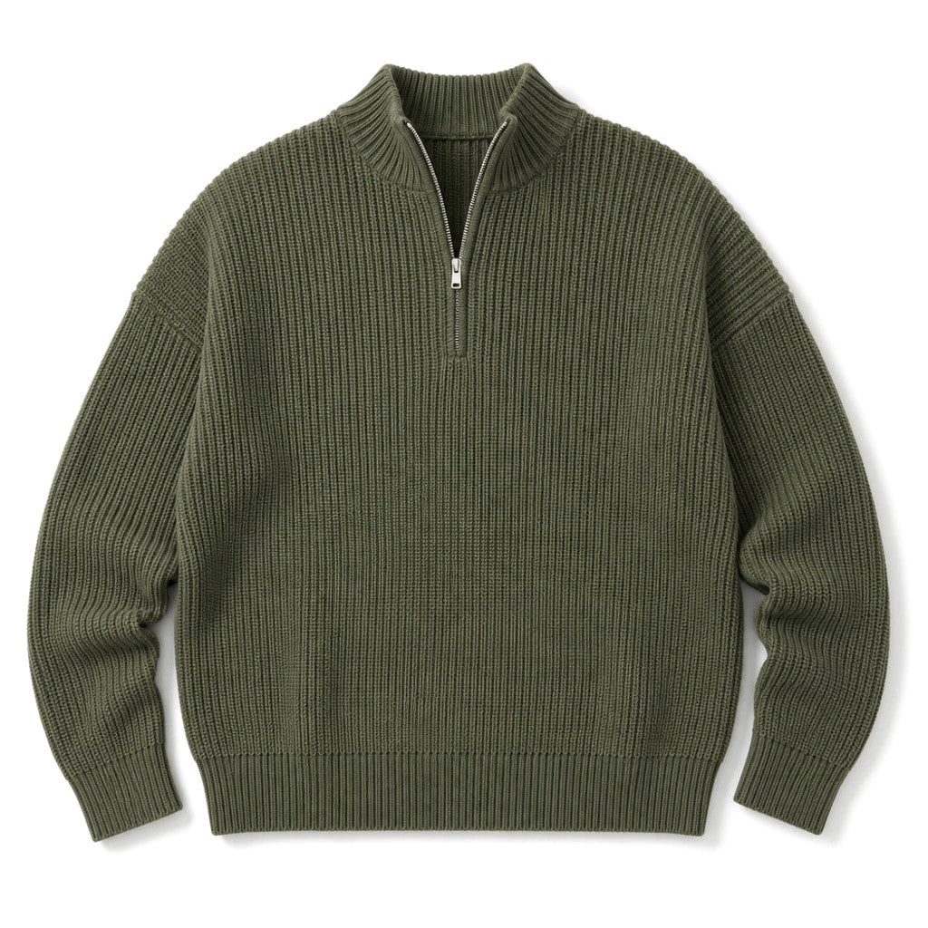 Man wearing green quarter zip jumper over a collared shirt