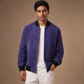 Indigo suede bomber jacket with ribbed collar, cuffs and hem, front zip closed