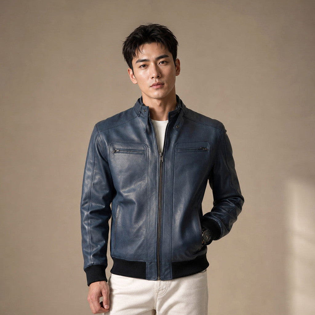 Blue leather bomber jacket with snap stand collar and ribbed hem