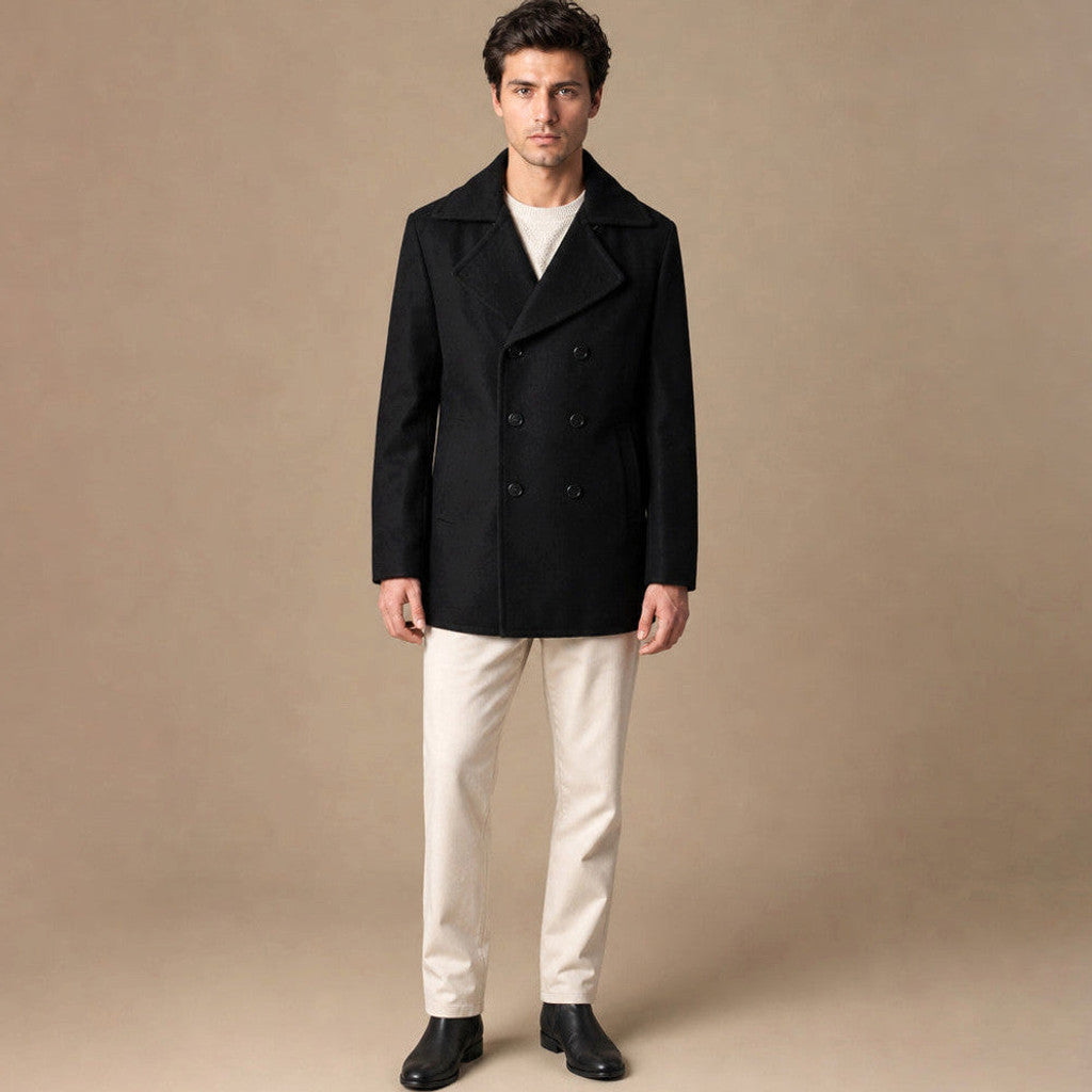 Black double-breasted wool pea coat shown front on