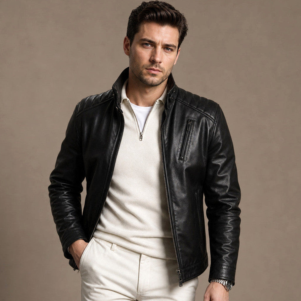 Man wearing a black sheepskin biker jacket with dark denim and boots