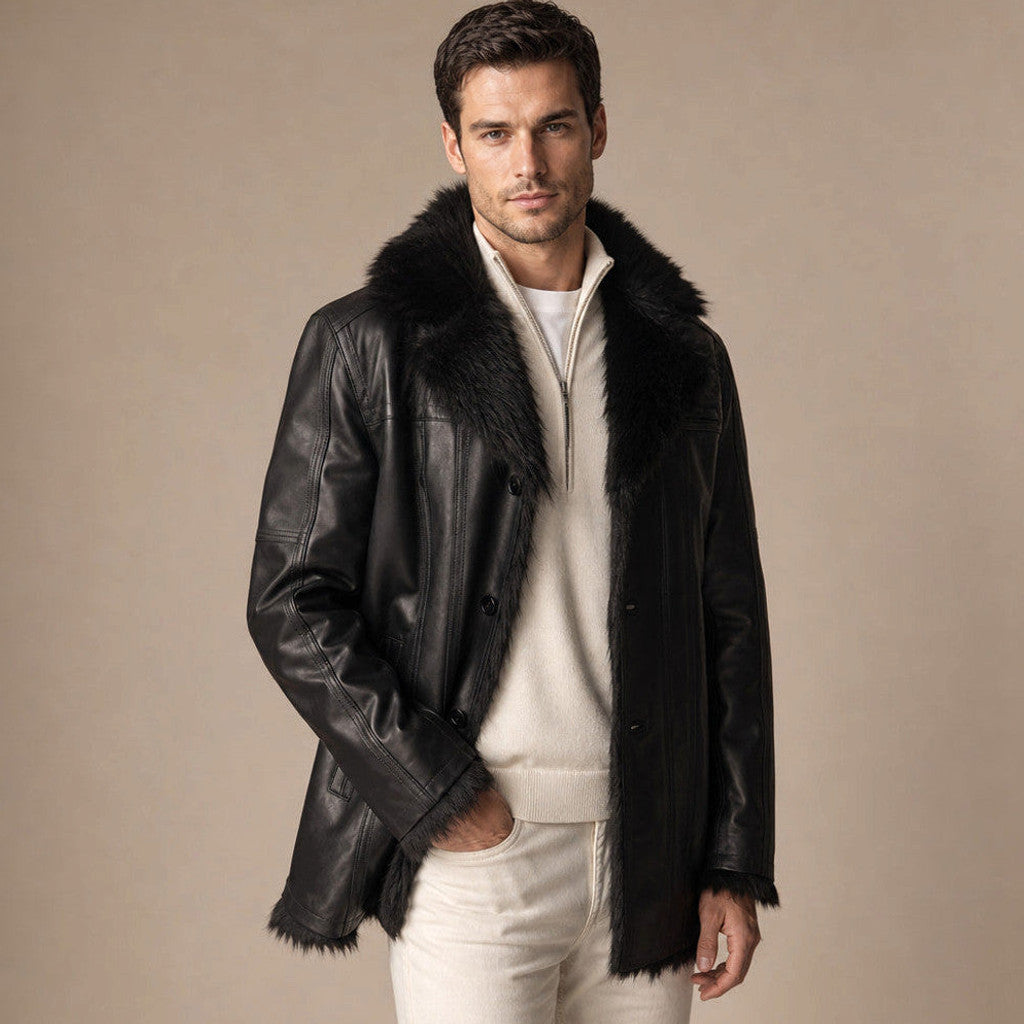 Man wearing a black shearling-lined leather pea coat, buttoned to the notch collar