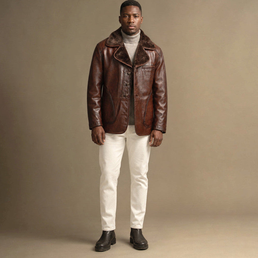 Man wearing a dark brown shearling leather pea coat with collar turned up