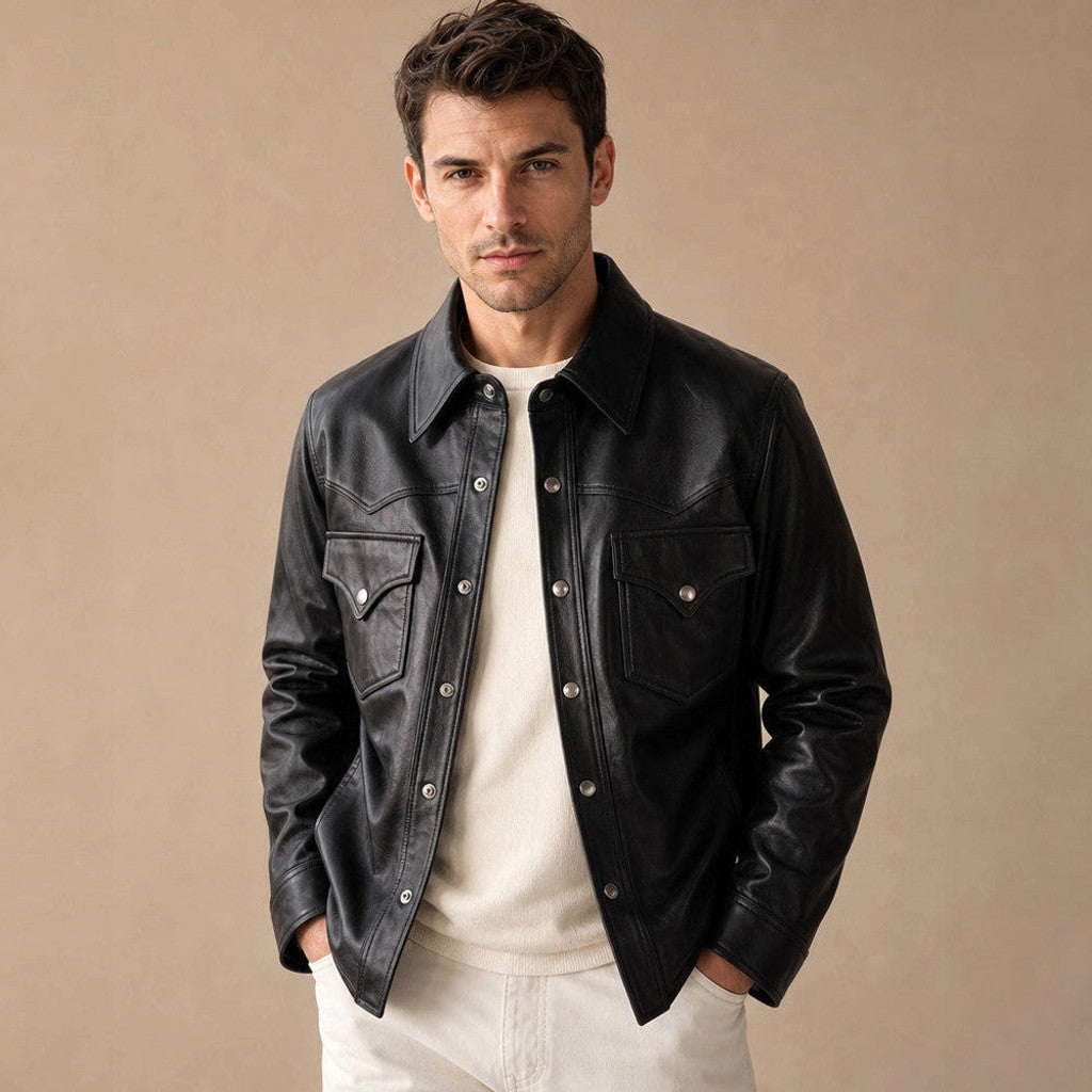 Man wearing black sheepskin trucker jacket over a tee with indigo denim