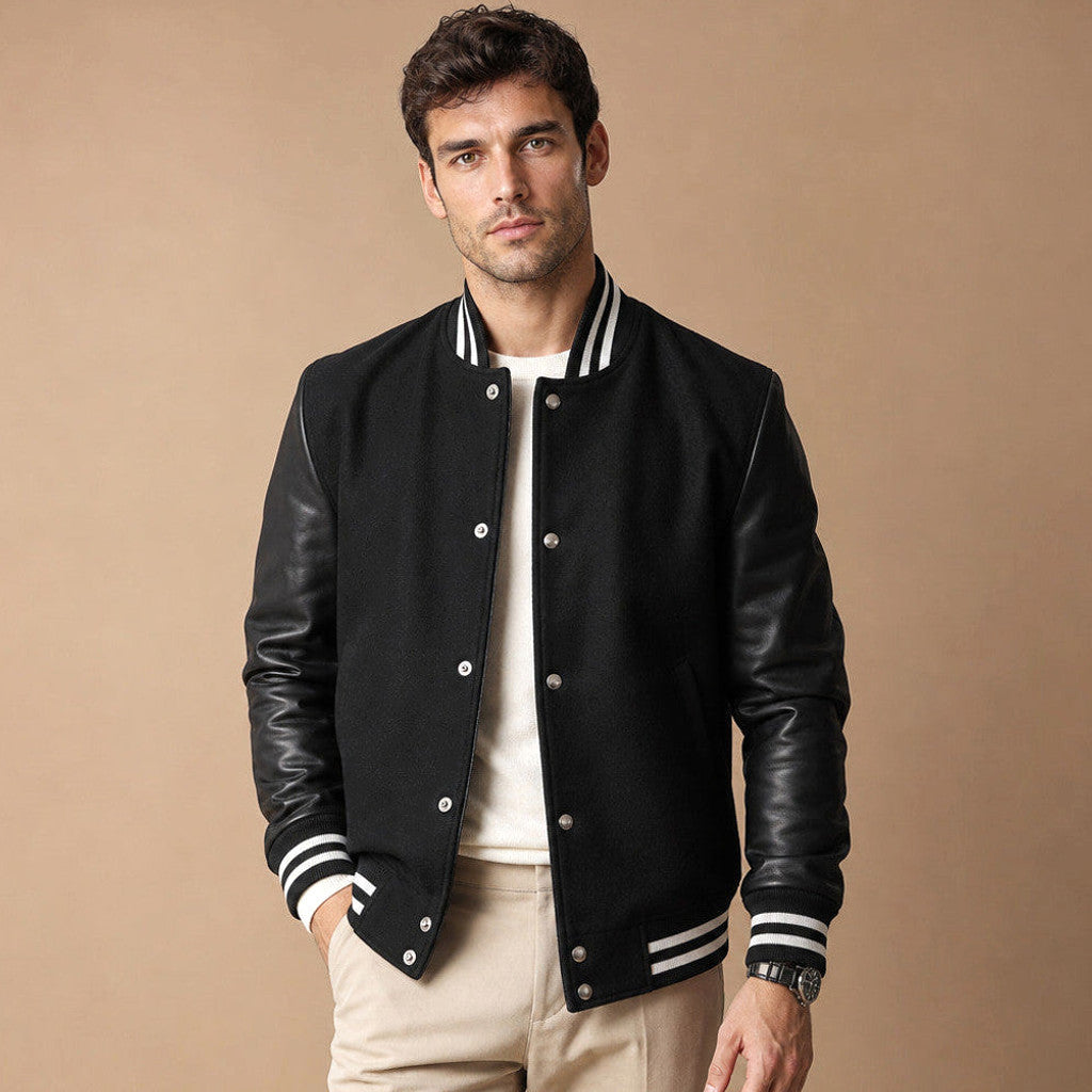 Black varsity jacket with wool body and leather sleeves, front view