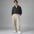 Halwick | Pleated Trouser Relaxed Fit Stretch Woven Khaki – Product Photo