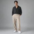 Halwick | Pleated Trouser Relaxed Fit Stretch Woven Khaki – Product Photo