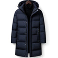 Man wearing dark blue hooded down parka with trousers