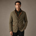 Man wearing green relaxed-fit workwear jacket over a tee
